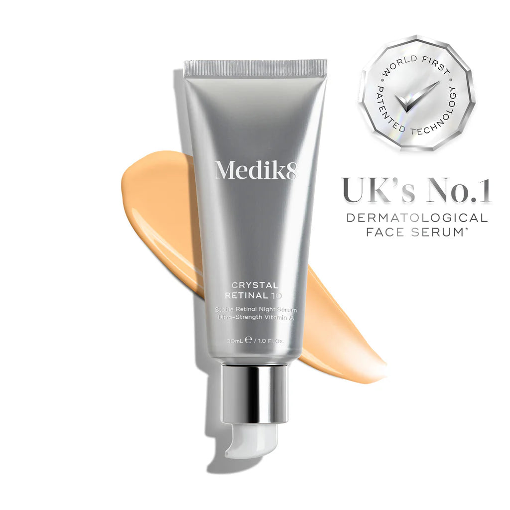 Medik8 Crystal Retinal 10 skincare night serum with 0.1% retinal, in a sleek bottle, designed for anti-aging and skin renewal.