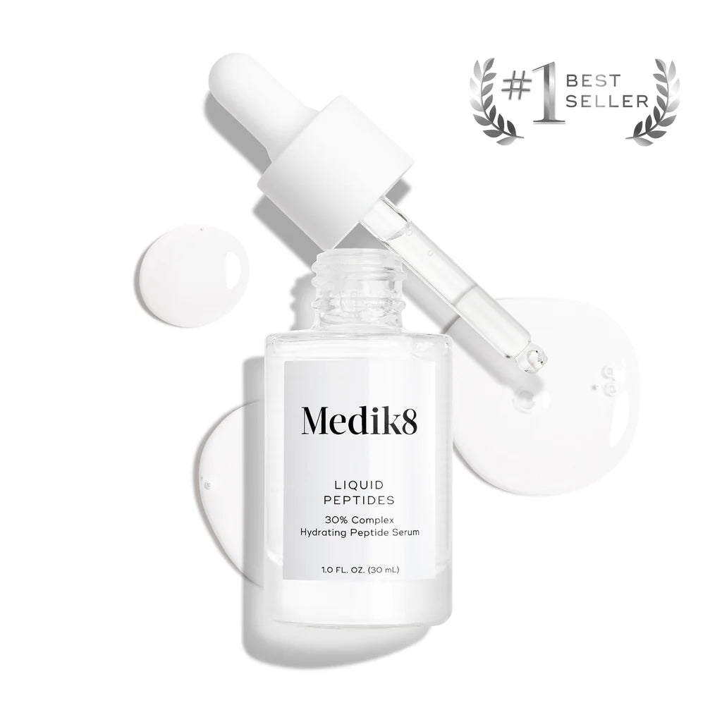Medik8 Liquid Peptides Multi-Peptide Serum in a glass bottle with a dropper for skincare and anti-aging benefits.