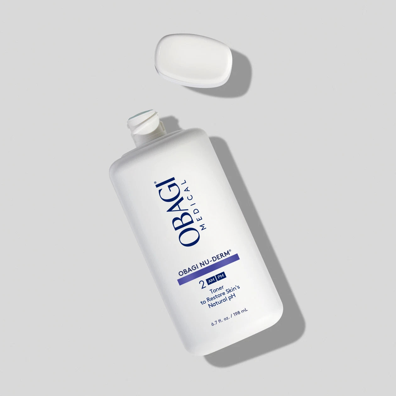 Obagi Nu-Derm Toner with the cap open.