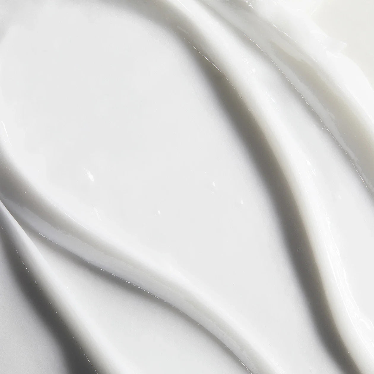 Obagi Nu-Derm 5 Blender skincare product in a sleek white container with black cap, designed for skin treatment and blending.