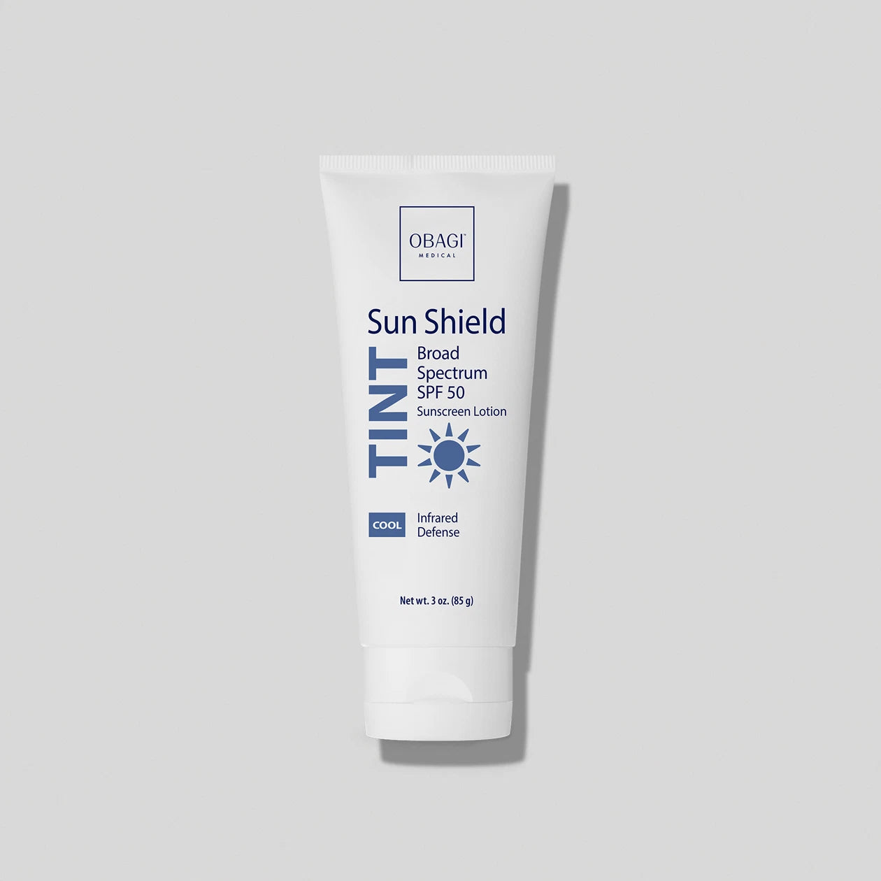 Obagi Sun Shield Tint Cool SPF50 skincare product with tinted formula and broad-spectrum sun protection in a tube.