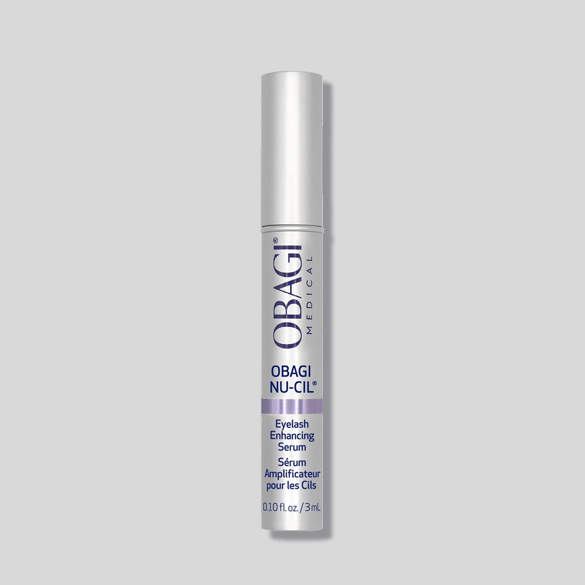 Obagi Nu-Cil eyelash enhancing serum in a 3ml tube, designed for eye, lash, and brow enhancement, with a sleek black applicator.