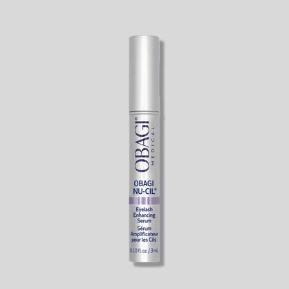 Obagi Nu-Cil eyelash enhancing serum in a 3ml tube, designed for eye, lash, and brow enhancement, with a sleek black applicator.