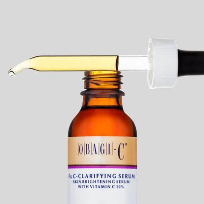 Obagi-C Fx C-Clarifying Serum with the dropper cap open.