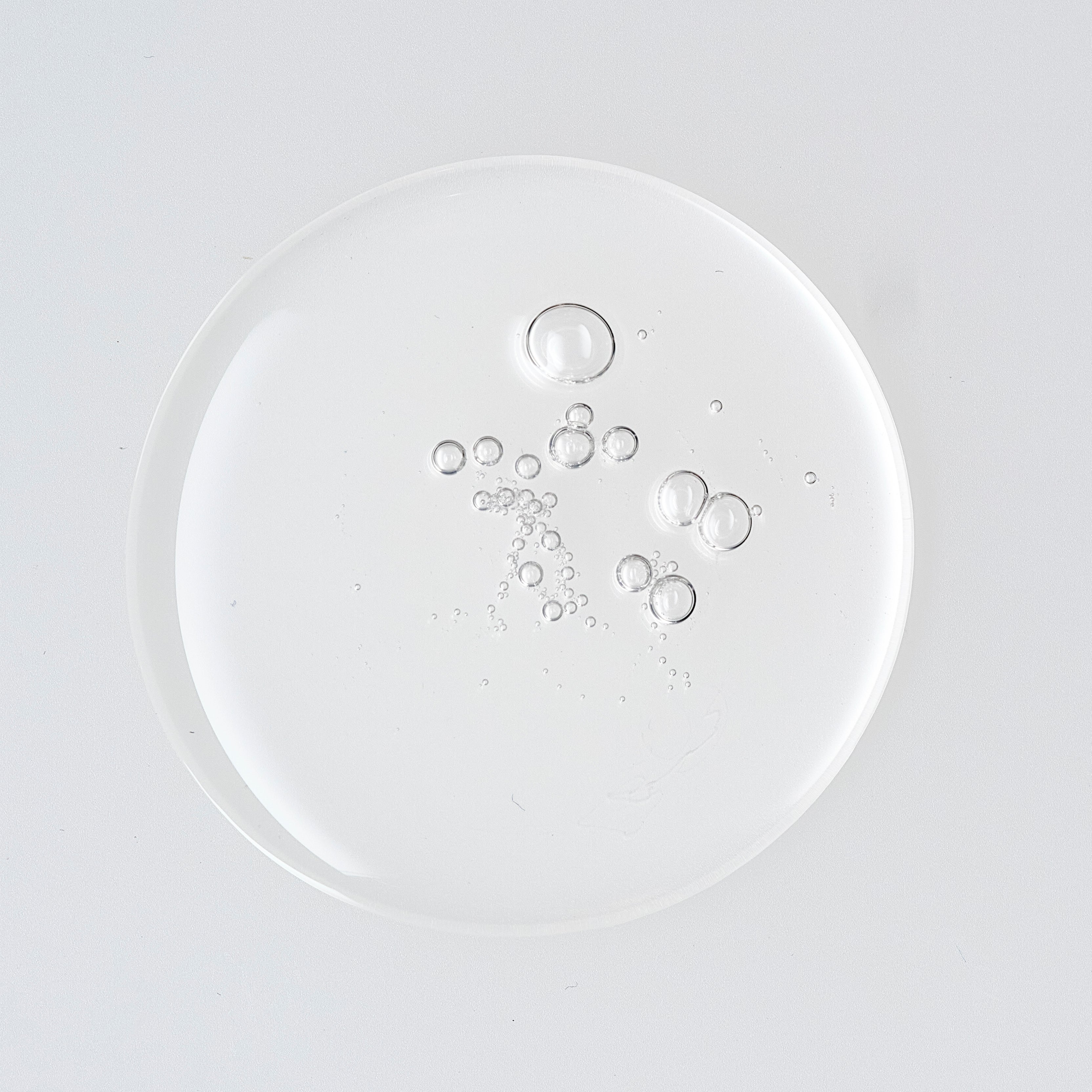Obagi CLENZIderm M.D. foaming cleanser with 2% salicylic acid, showing its smooth, foaming texture for acne-prone skin.