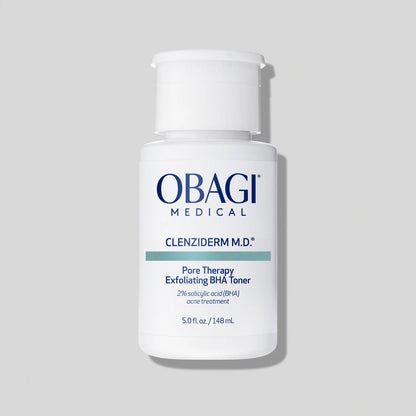 Obagi CLENZIderm M.D Pore Therapy skincare bottle with label, designed to reduce pore size and improve skin clarity.