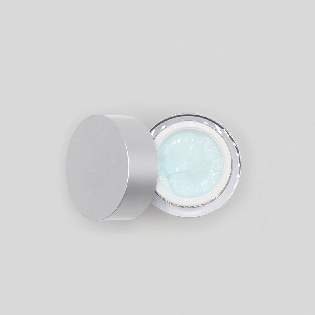 Obagi ELASTIderm Eye Cream in a jar, a firming and smoothing eye treatment for reducing puffiness and fine lines.