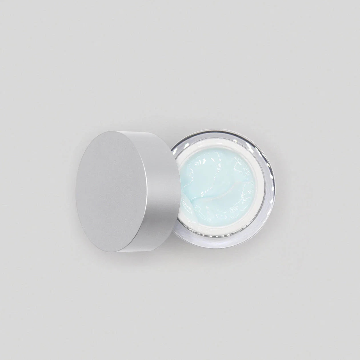 Obagi ELASTIderm Eye Cream in a jar, a firming and smoothing eye treatment for reducing puffiness and fine lines.
