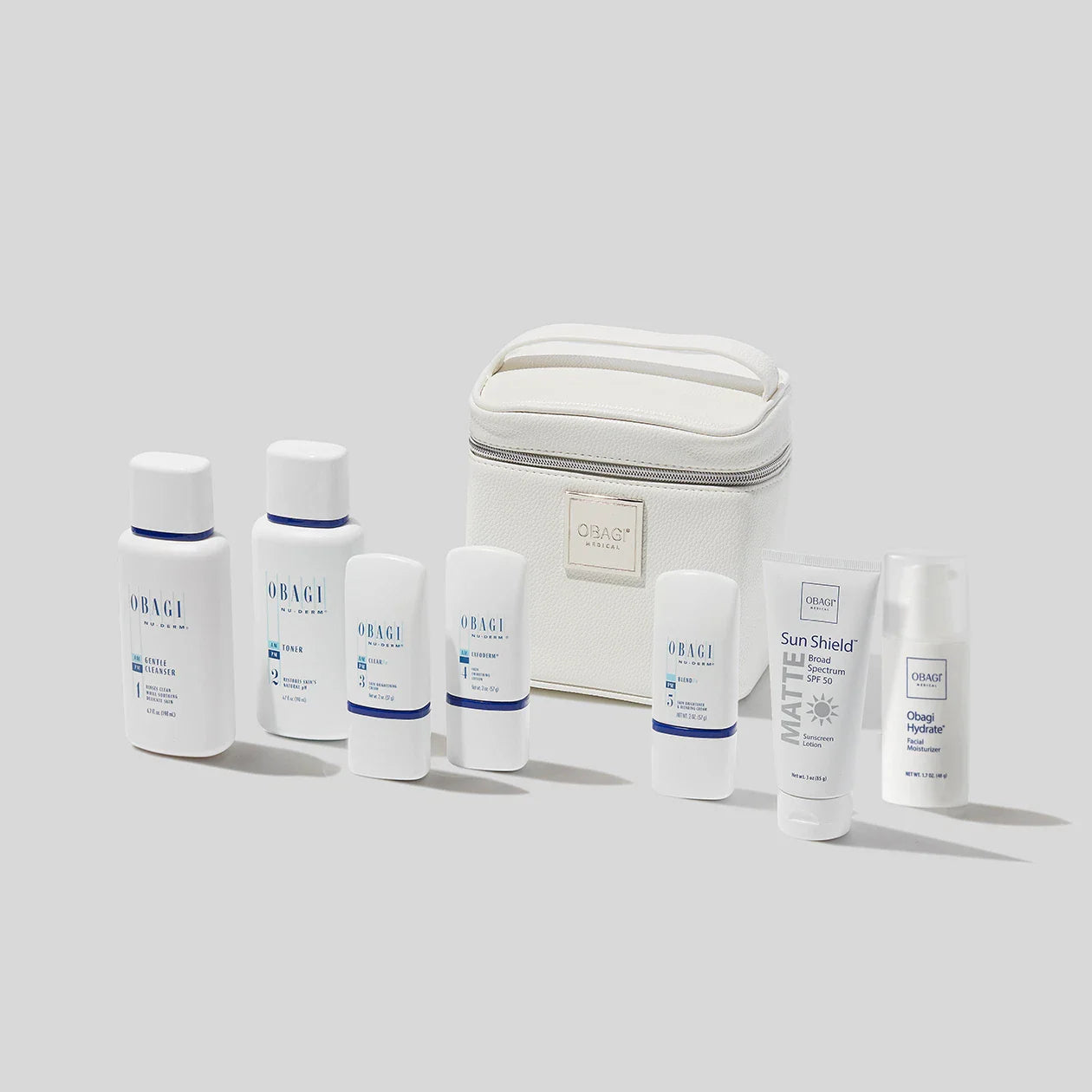 Obagi Nu-derm FX Skin Transformation System for normal to dry skin, featuring skincare products with clean packaging and applicators.