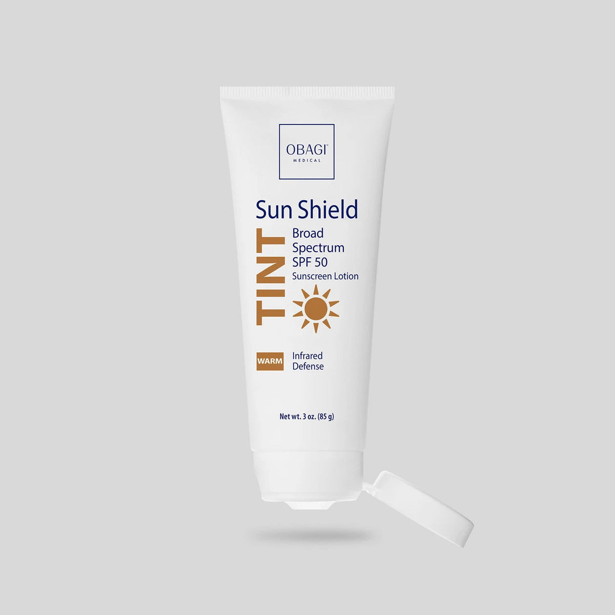 Obagi Sun Shield Tint SPF 50 Warm with cap open.