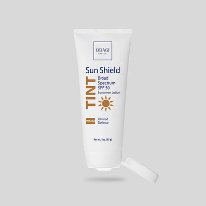 Obagi Sun Shield Tint SPF 50 Warm with cap open.