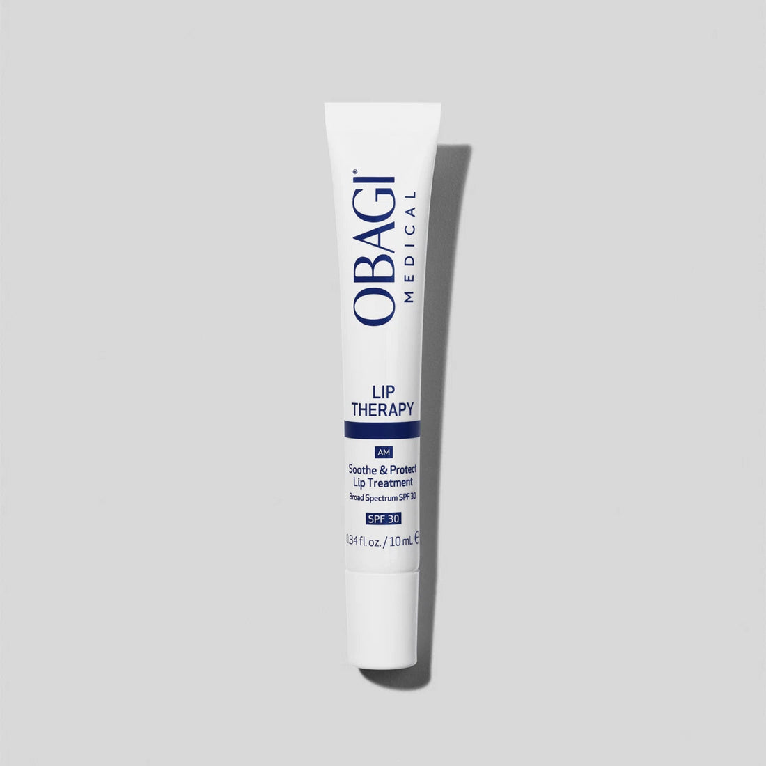 Obagi Lip Therapy Sooth &amp; Protect Lip Treatment SPF30 applied on lips, featuring moisturizing and protective skincare benefits