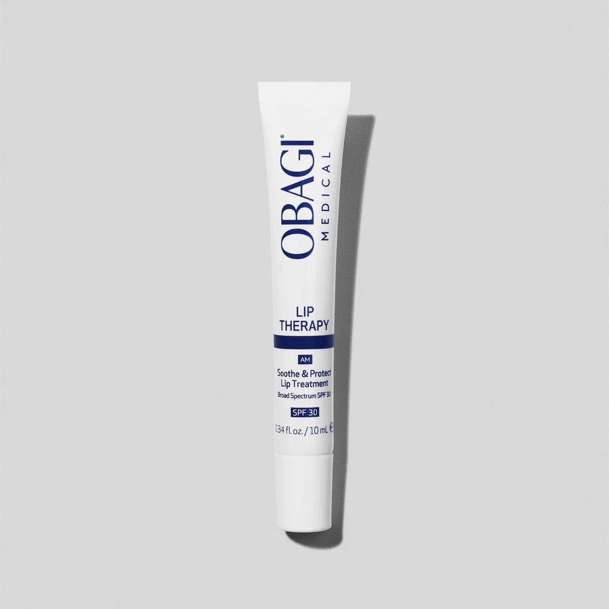 Obagi Lip Therapy Sooth &amp; Protect Lip Treatment SPF30 applied on lips, featuring moisturizing and protective skincare benefits